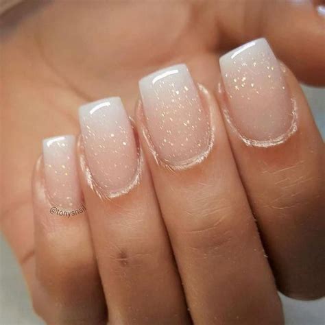 So, we have done some of the work for you and found 63 of the most beautiful nude nails on Instagram. You will find glittery looks, trendy patterns, sparkling rhinestone nails and much more. 1. Nude Matte Nails with Glitter. We are starting off our top picks with this stylish and sparkly idea.